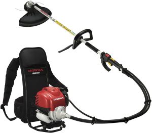 La débroussailleuse Honda UMR 435T LE est présentée de face avec ses accessoires.
